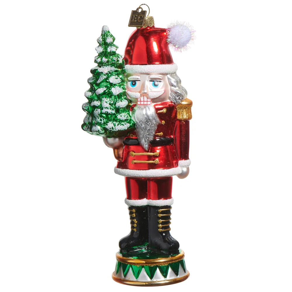 Nutcracker Holding Christmas Tree Glass Ornament 7"