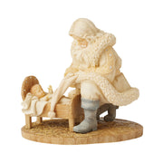 Santa with Baby Jesus Figurine