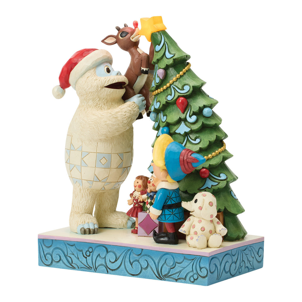 Bumble Holding Rudolph by Tree